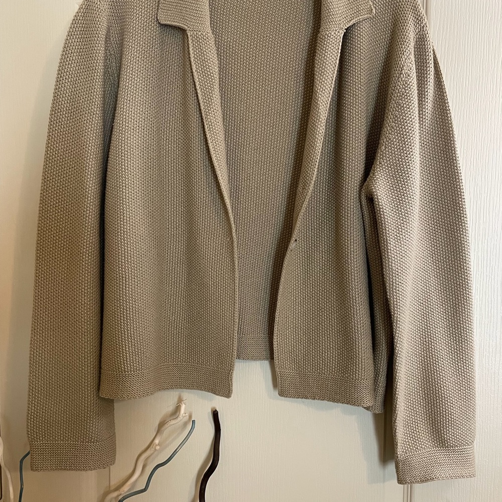 Casual knitted khaki sweater perfect for transitional weather.